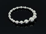 mAgnetico Signature sterling silver beaded bracelet is made with 4mm-12mm sterling silver beads, bead spacers and a durable elastic cord.