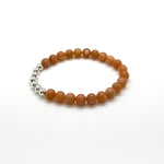 This bracelet is made with 6mm multi-colour Moonstone gemstone beads and 7 sterling silver accent beads.